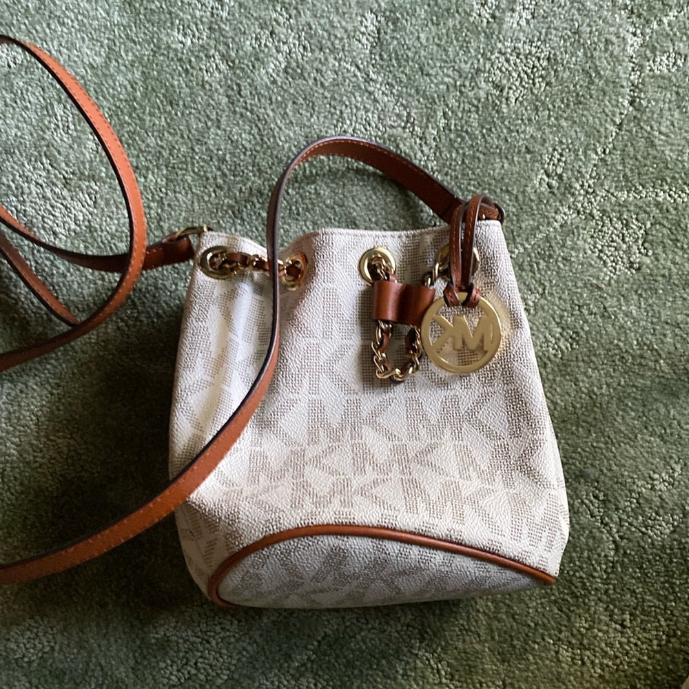 Michael Kors vanilla and gold crossbody drawstring bucket